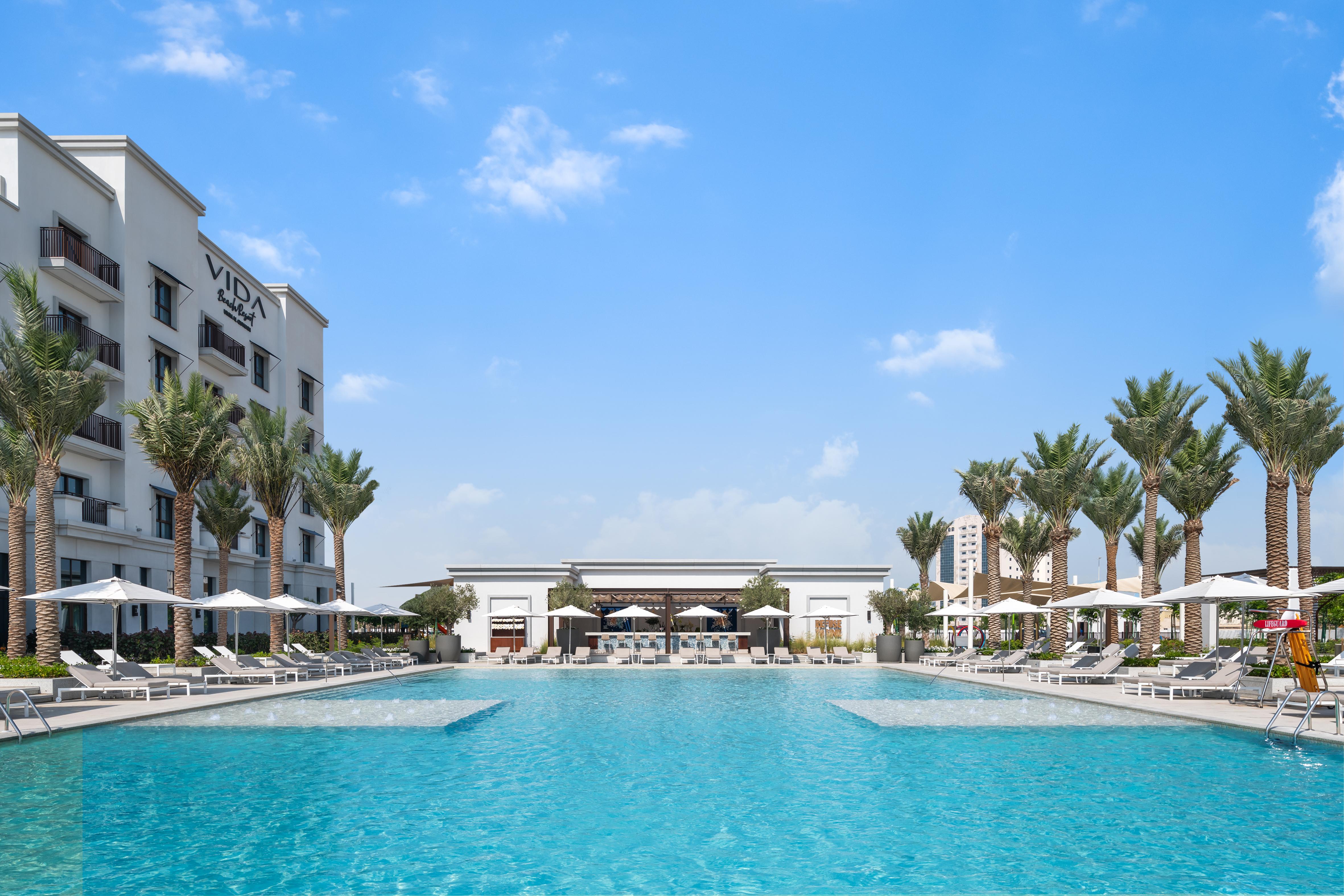 Vida Beach Resort Umm Al Quwain Exterior photo View of the pool at Vida Downtown Dubai
